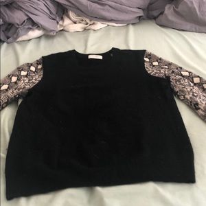 Equipment sweater with snake print sleeves